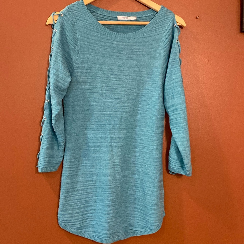 Ricki’s teal blue light sweater in size extra small.